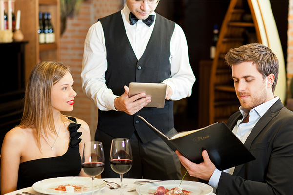 waiter taking order with ipad